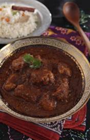 Indiase boterkip curry met gekruide basmatirijst recept