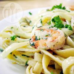 Pittige en romige pasta met zeevruchten recept