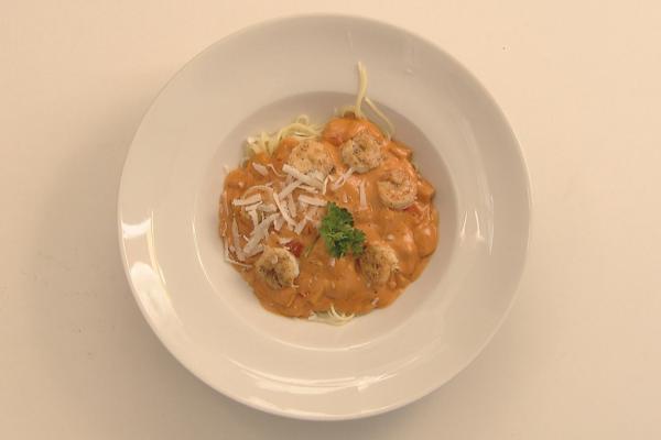 Scampi in een paprika-roomsausje met pasta