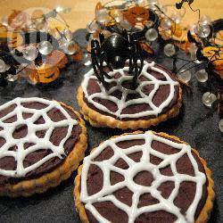 Halloweenkoekjes met spinnenweb recept