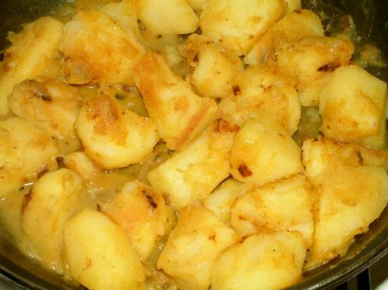Aardappelen met kerrie en uien recept