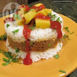 Arroz tapado (rijst bovenop) recept