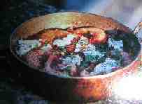 Langoustines in tomatensaus met feta recept