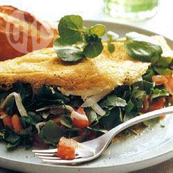 Omelet met waterkers, gruyère en tomaat recept