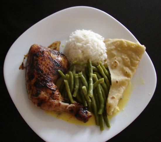 Surinaamse maaltijd met kippebout en roti recept