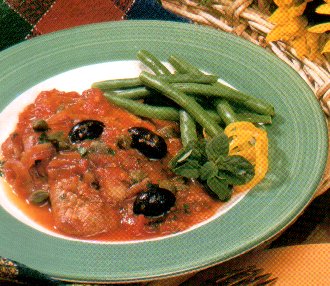 Kalfsvlees met tomaten-olijvensaus recept