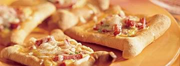 Minipizza met salami en kaas recept