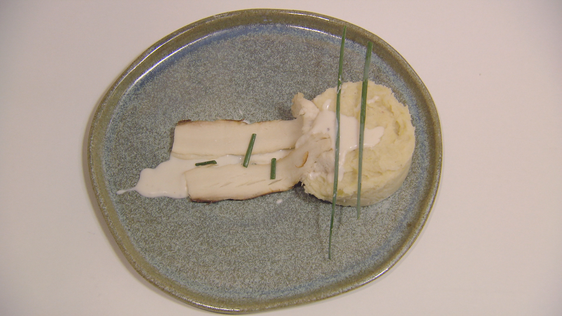 Stoemp van aardappelen en prei en met gerookte paling