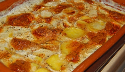 Romige aardappelgratin met rozemarijn en tijm recept