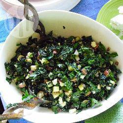 Boerenkool salade met krenten en gorgonzola recept