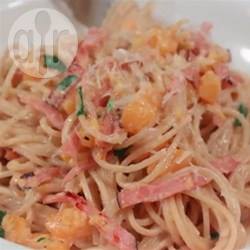 Spaghetti met ham en pompoen recept