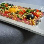 Aardappelkruim met carpaccio nicoise recept